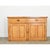 A gorgeous pine buffet from 19th century England, the restrained construction highlights the glowing effect of the blonde...