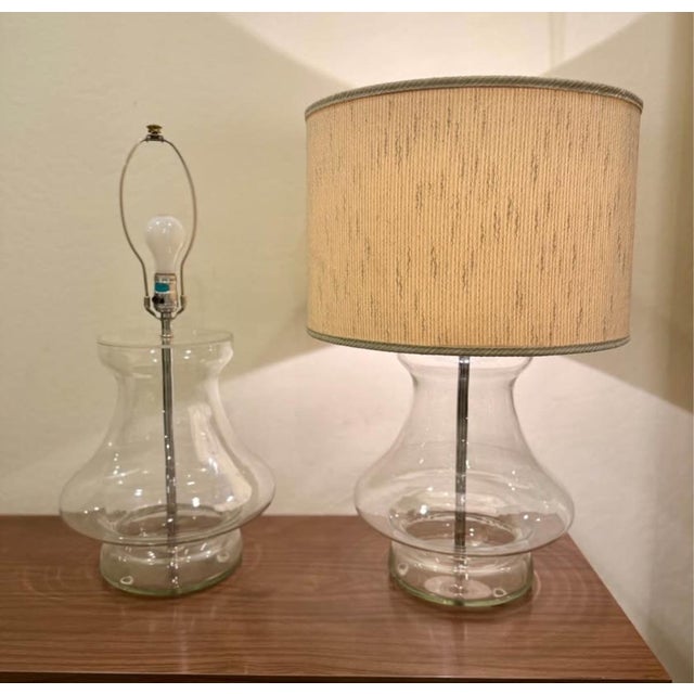 Sold as a pair, these two transparent glass table lamps by Kovacs are in excellent condition. Shipping & Local delivery...