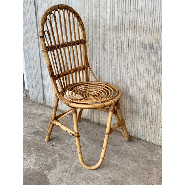 Five French bamboo and rattan dining or occasional chairs. Excellent original condition. No breaks to the bamboo or rattan.