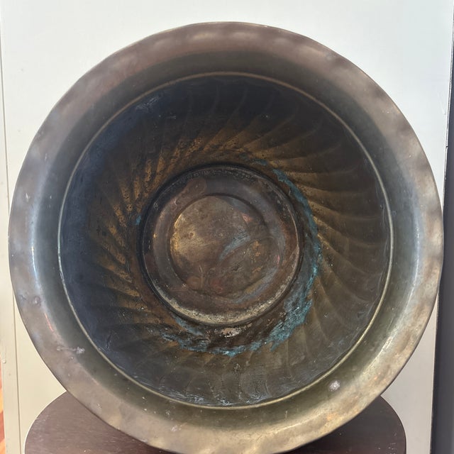 Substantial 1980s vintage brass cachepot or jardinière featuring a deeply fluted body and gracefully scalloped upper rim....