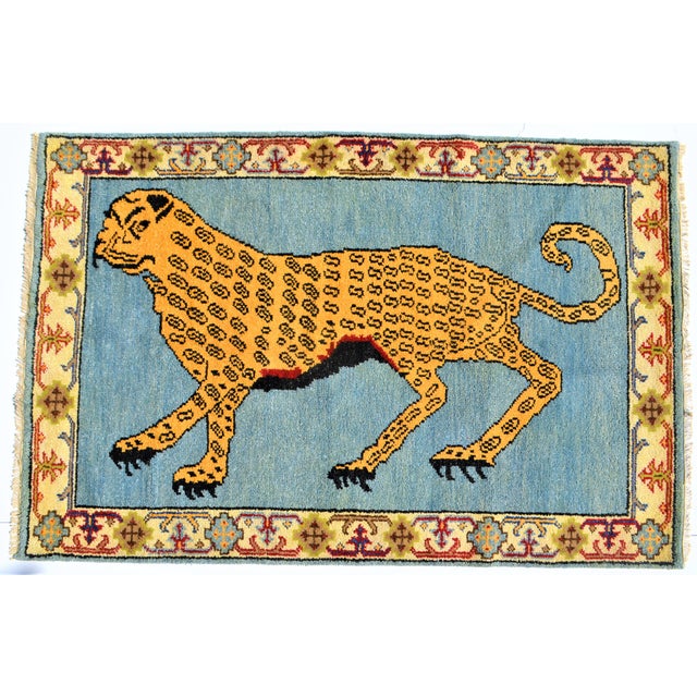 This is a very chic vintage leopard pictorial Turkish rug. We are unsure of the age, but believe it to be circa 70's. It...