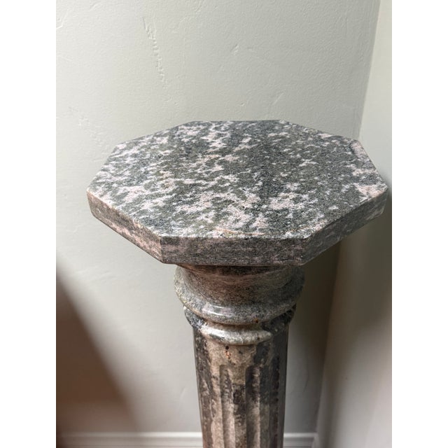 This elegant vintage pedestal is crafted from rich green marble, showcasing timeless classical design with its fluted...