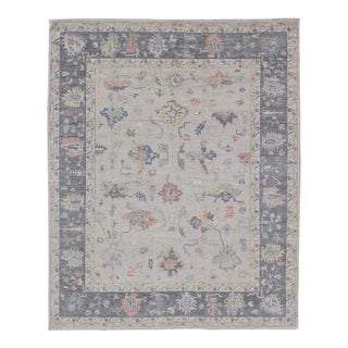 Modern Oushak Rug With Slate Blue Border and Colorful All-Over Tribal Motifs For Sale