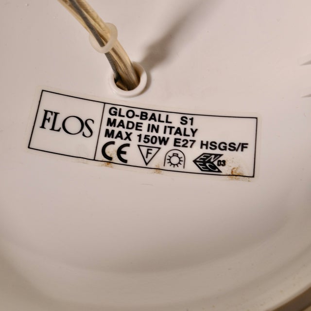 The glo ball s1 pendant lamp by flos was designed by jasper morrison in 1998. Marrying the functional with the...