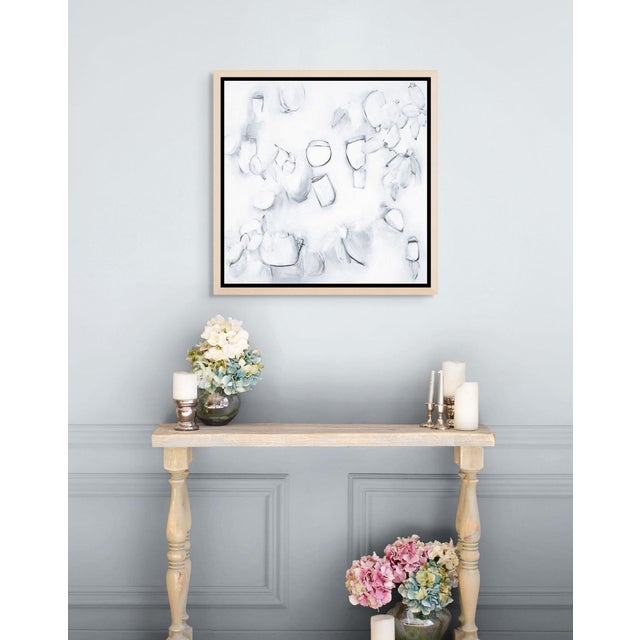Float No. 26 is a textured abstract black and white painting on canvas with a balanced square composition and a layered,...