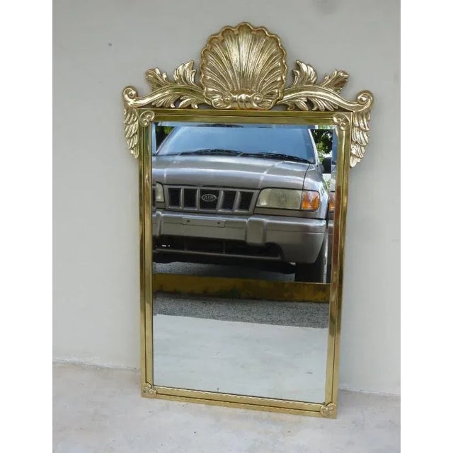Vintage Decorative Arts Brass / Bronze Mirror W Shell Pediment sold as found in vintage condition without damage measuring...