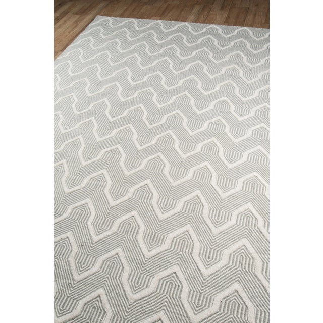 COZY VIBE: A pastel color palette and plush fibers make this rug a perfect floorcovering for rooms seeking a soft...