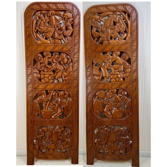An extraordinary set of four monumental hand-carved wood panels acquired directly from a Yoruba craftsman in Lagos,...