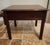 An exceptional vintage end table by Drexel Heritage. Executed in the classic Chippendale style, this is crafted from high-...
