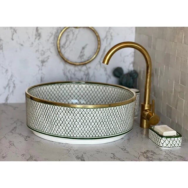 Our Ceramic Sink is stunning addition to elevate your bathroom decor. Handcrafted with meticulous attention to detail,...