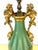 French Putti Motif Ormolu-Mounted Chinese Celadon Vase, Now as a Lamp A graceful 19th-century Chinese celadon-glazed...