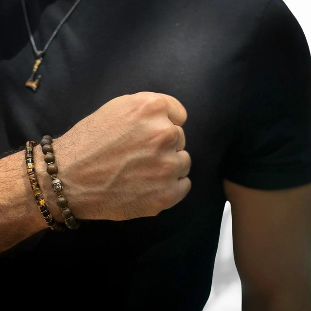 Enhance your style and inner balance with the Men's Tiger's Eye Stone Adjustable Balance Bracelet. This striking bracelet...