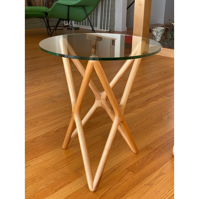 Aeon Starlight Side Table, featuring a six-pointed star frame constructed from solid American Ash in a natural finish and...