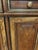 Crafted from walnut with beautiful brass accents and unique paint-decorated cabinet doors, this Renaissance, Tuscan-...