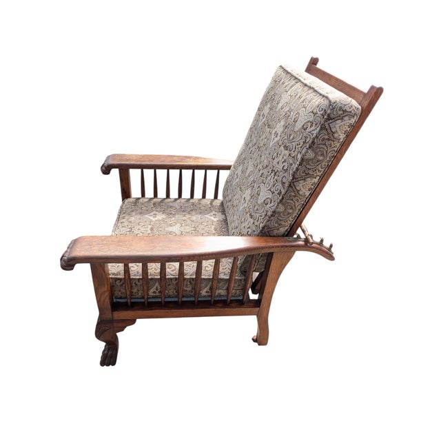 Wonderful Mission Style Morris adjustable armchair, with carved Lions head arms and feet. Paisley upholstery, and matching...