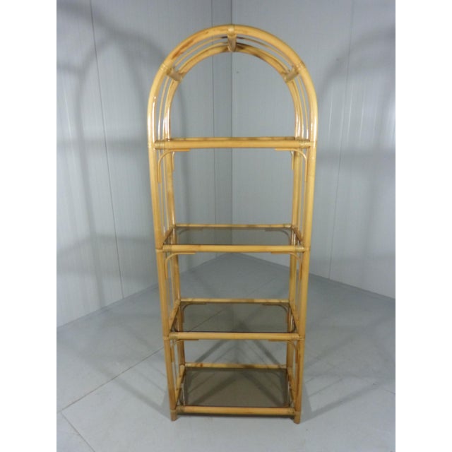 Rattan rack / display. 4 Smoked glass shelves.