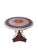 Garden table, France, circa 1900. Painted wood base with a circular painted top. The top is worked in concentric bands: a...