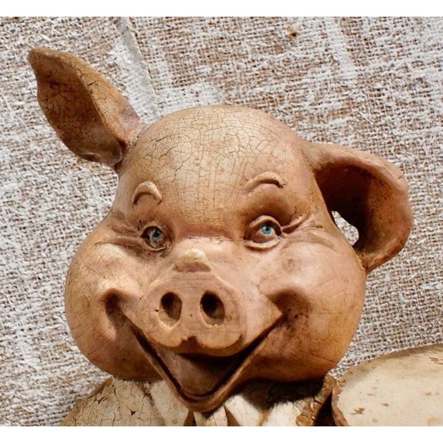 A lovely antique butchers shop display pig. An English, plasterwork commercial advertising pig, holding a platter stood on...