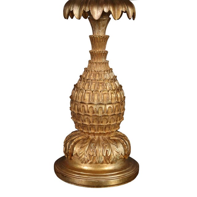 A monumental Serge Roche style gilt pineapple lamp crafted of gesso with foliate details at top and acanthus leaf motif at...