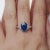 This vintage platinum ring from the 1980’s is set with an AGL certified oval cut sapphire weighing 5.82 carats, of Ceylon...