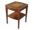 Mid 20th Century mahogany side or end table. Features a traditional Sheraton style form with a serpentine tooled leather...