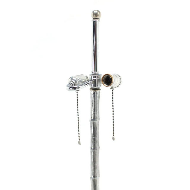 Nice casted faux bamboo shaft lotus base chrome floor lamp. Perfect for the living room space.