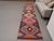 Vintage Hand-Knotted runner rug is a semi-antique vintage area rug. The '70s Eastern region of Anatolia's unique rug is...