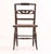 A beautifully assembled set of ten Hitchcock dining chairs, crafted in ebonized hardwood with handwoven rush seats and the...