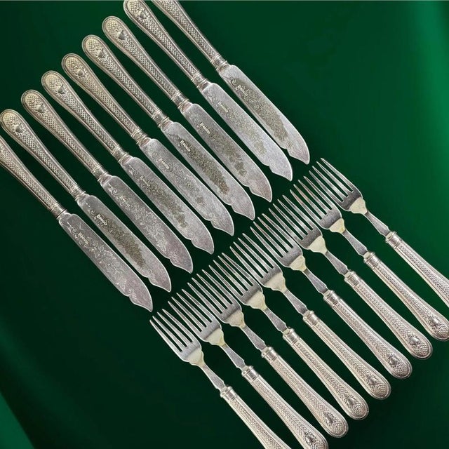 A unique and rare set of antique cutlery. This English Victorian style set consists of 9 knives and 9 forks, richly...