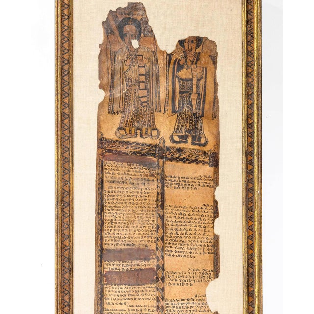 A magic healing talismanic scroll from Ethiopia circa 19th century known as Tälsäm or yä bərana kətab. Presented in a...