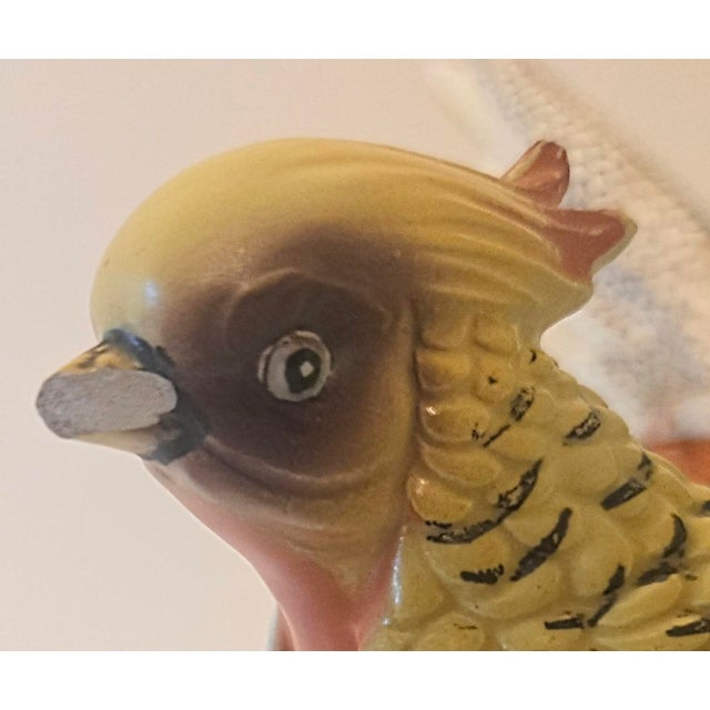 These are mid century made in Japan, by Inarko. You totally know I had to find out if it was a real bird. It's a Chinese...