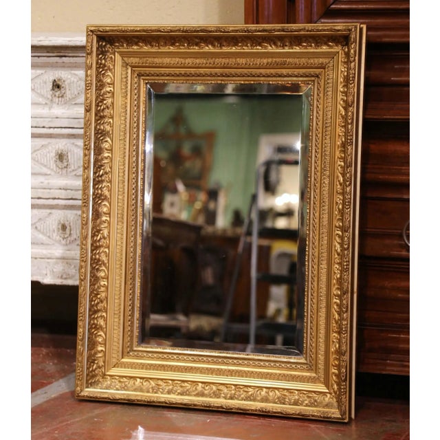 Decorate a powder room, entryway, or bedroom with this elegant antique Napoleon III giltwood wall mirror crafted in...