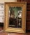 Decorate a powder room, entryway, or bedroom with this elegant antique Napoleon III giltwood wall mirror crafted in...