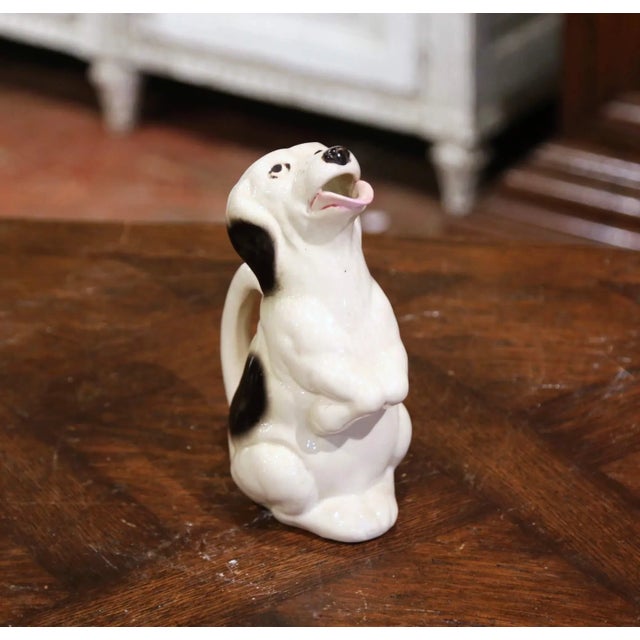Full of personality, this vintage ceramic pitcher is modeled as a seated dog begging for a treat. Crafted in France circa...