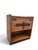 This Amsterdam School cabinet is a striking example of early 20th-century Dutch design. The piece showcases the...