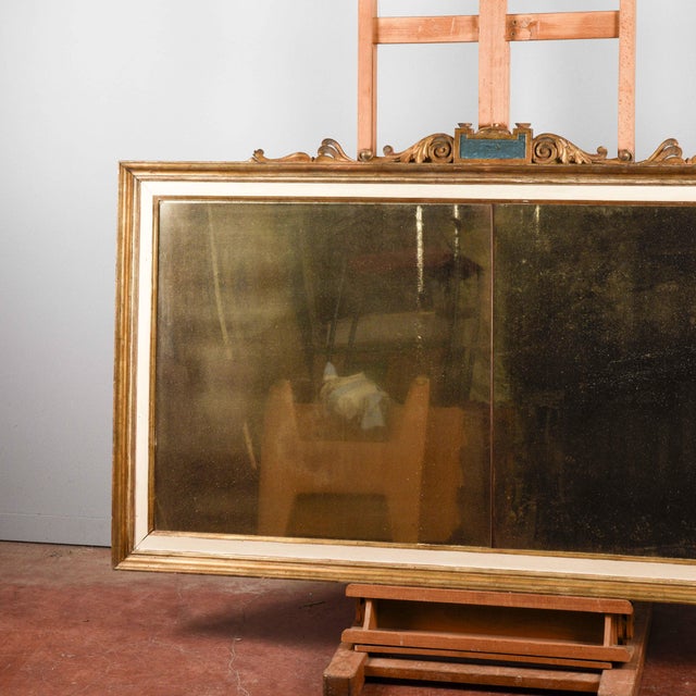 This lacquered mirror or dressing table, with its mercury glass, is an antique piece reflecting the opulence and...