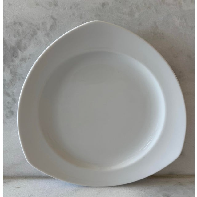 Elegant and simple Thomas Vario White salad plates in a triangular shape. These plates are produced by Rosenthal Group in...