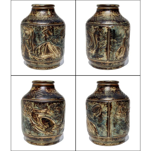 A classic piece of pottery by Jais Nielsen for Royal Copenhagen, mid-century vintage. Molded stoneware vase featuring two...