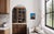 The artwork features a striking depiction of a helmeted figure against a vibrant blue background, exuding a sense of...