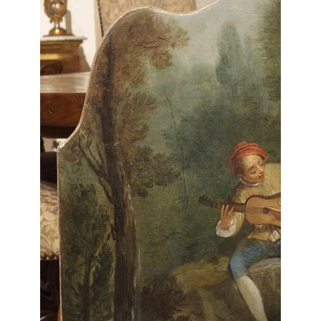 This colorful and gleeful genre painting is from France, circa 1770. Genre paintings depict people engaged in common...