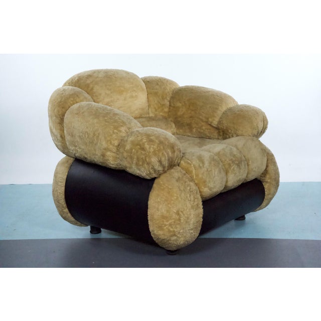 A rare single armchair designed by Adriano Piazzesi, produced in Italy during the 1970s. Upholstered in its original cream...