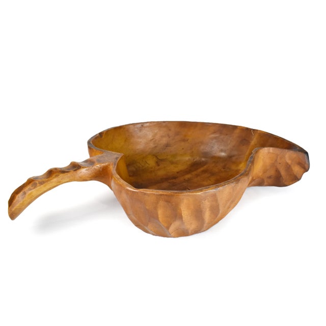 This bowl showcases the beauty of natural materials and craftsmanship. Crafted from solid wood, the bowl is shaped like a...