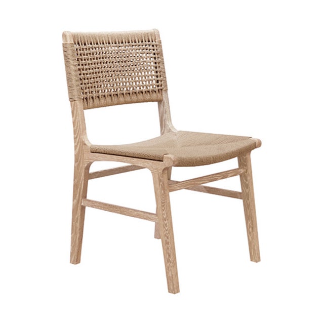 Brand new special order item. Not vintage. Elevate your space with the distinctive rattan-wrapped Monroe Dining Chairs...