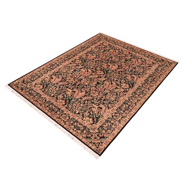 Designed with mesmerizing intricacy and gorgeous color palette, this hand-knotted masterpiece demonstrates the beauty and...