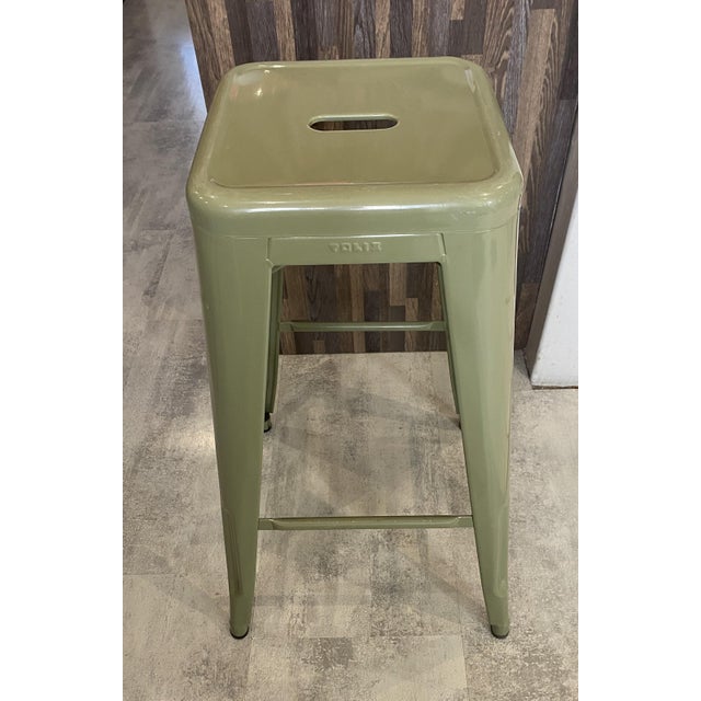 Authentic tolix bar stool designed by xavier pauchard. this h75 stool, with its industrial design and backless...
