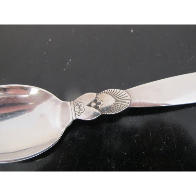 Georg Jensen sterling silver, large child's spoon in Cactus design. Measures approximate 5 7/8". Weighs 34 grams. In...