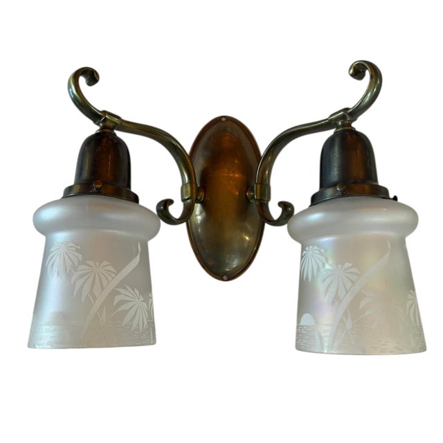 These are a fabulous pair of sconces that will add big charm to any room. A rare set of four botanical shades adorn the...