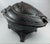 A completely original 19th century French polished cast iron fire basket grate in the Rococo style. A shaped high back...