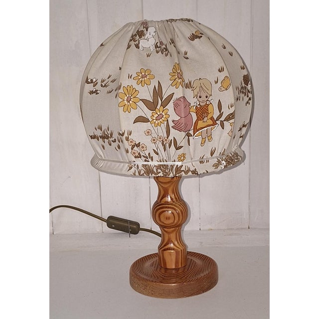 Vintage Turned Pine Table Lamp with Fabric Shade, 1970s, in Very Good conditions. Designed 1970 to 1979 European Plug (up...