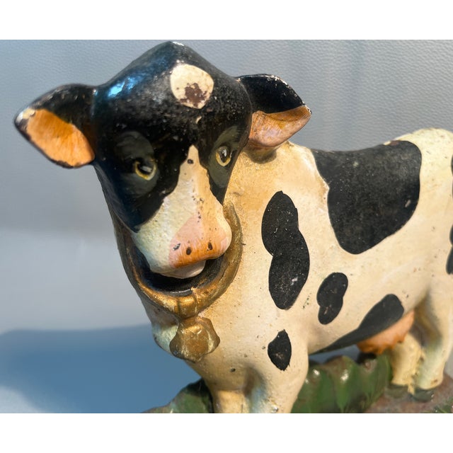 Add this decorative farmhouse accent to any room. Made of heavy cast iron. Signed, but we can’t read the signature. Hand...